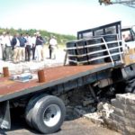 A 15,000-lb medium-duty truck crashed into a wall barrier