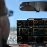 Motorist looking at changeable message sign