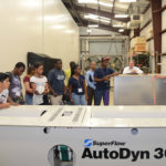 Students from the Summer Transportation Institute tour the Emissions Research Facility at the Texas A&M Transportation Institute