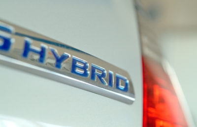 Close-up of hybrid decal on rear of Toyota Prius.