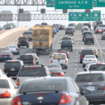 Vehicles on a congested freeway.