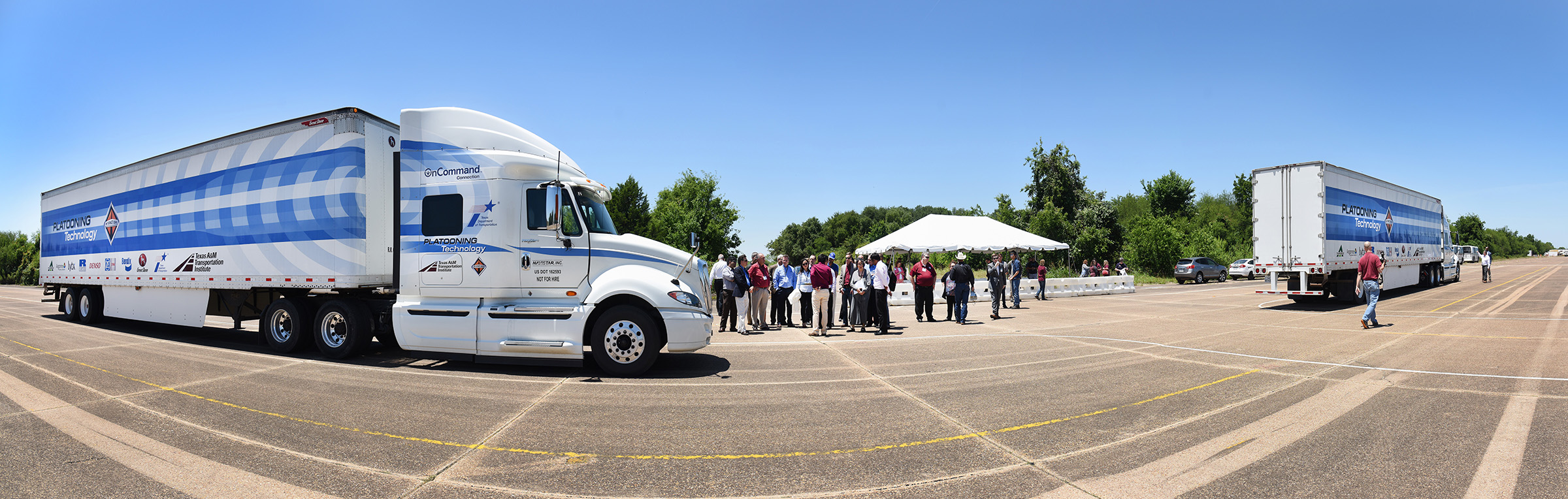 A panoramic photo showing the truck platooning demonstration at the Texas A&M University System's RELLIS Campus.
