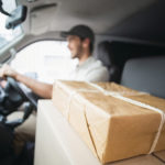 Delivery driving with packages inside vehicle.