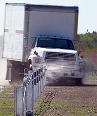 large box truck striking guard rail at proving ground