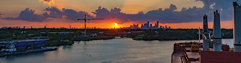 Port of Houston with down town Houston skyline in view at sunset