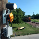 A utility pole in Fremont, Nebraska that supports some of the equipment for a rail-monitoring system developed by TTI.