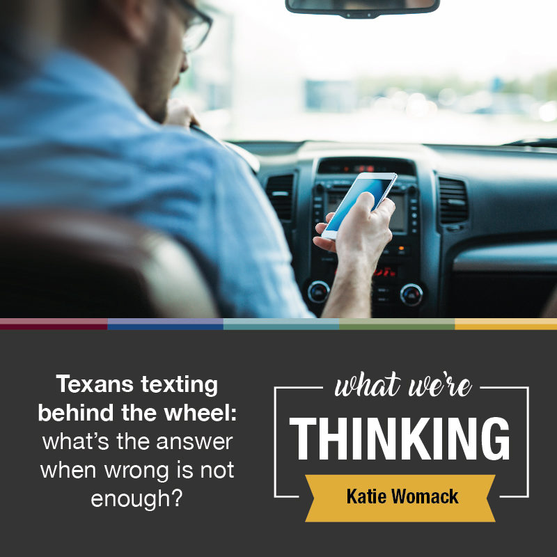 Person using a cell phone while driving. Text: What We're Thinking, by Katie Womack.