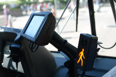 Connected and automated vehicle technology installed on a transit bus to warn the driver of pedestrians nearby.