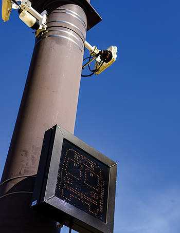 Visual and audio equipment mounted to a light pole at the test intersection.