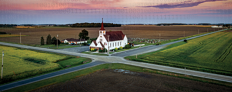 Aerial view of the intersection of two rural roads.