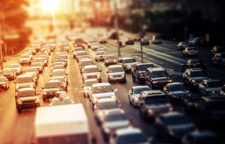 Car traffic in the sunset on a road