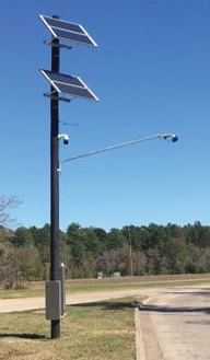 The TTI-developed entry detection system installed on a utility pole in a rest area.