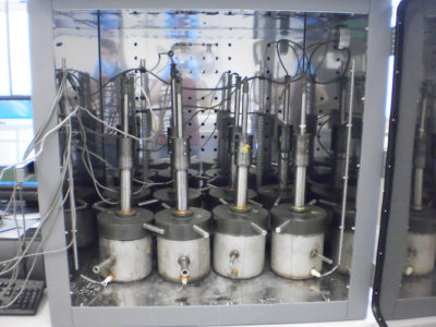 A series of fully assembled VCMD devices inside an oven.