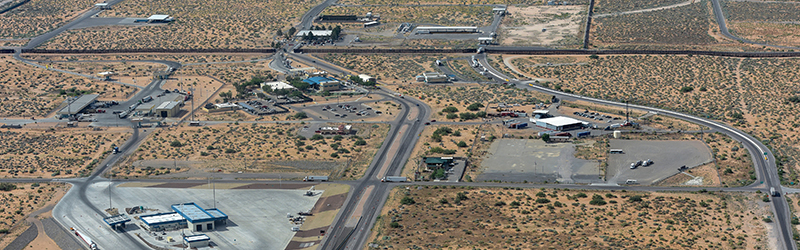 Aerial photograph of facilities at a Texas-Mexico border crossing.