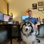 photo of Jack Kong and his pets in a home office