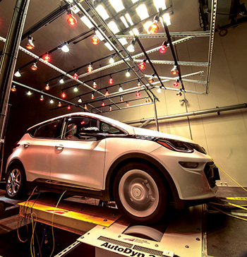 An electric vehicle (Chevrolet Bolt) being tested inside TTI’s environmental test chamber.