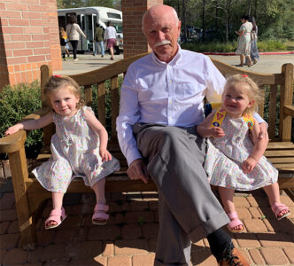 A photo of Tom Scullion and his twin granddaughters.