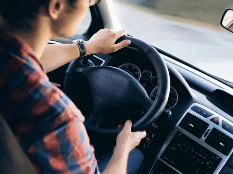 Individual operating a motor vehicle.