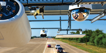 Photograph taken from the toll gantry showing the installed cameras and plate readers.