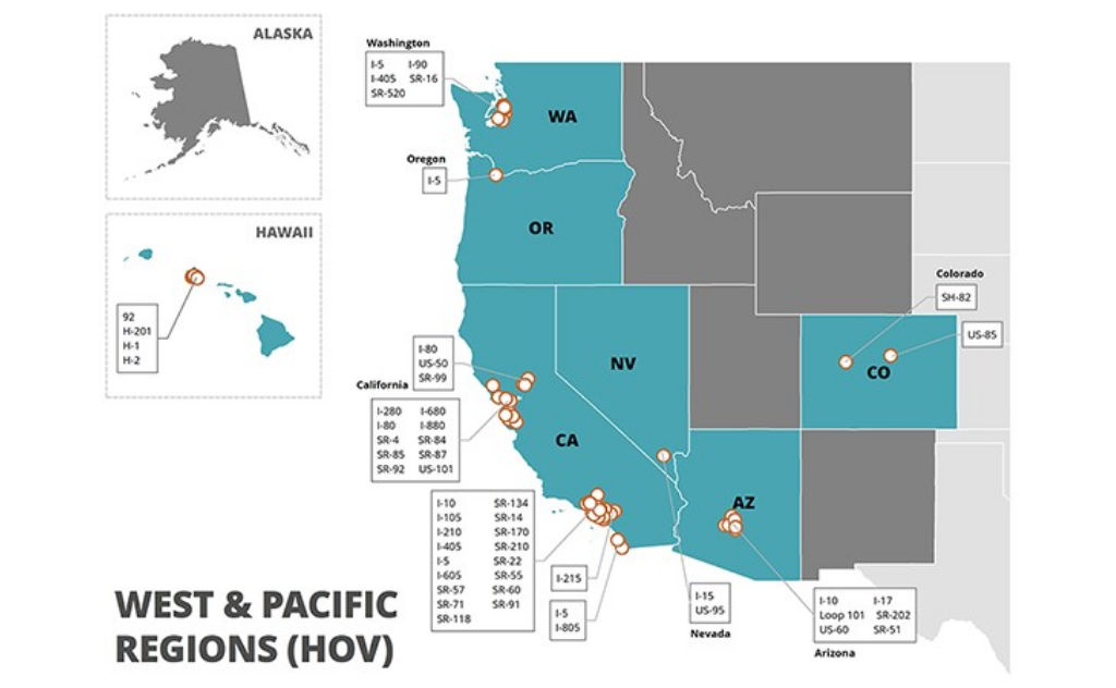 A row of trucks and one car parked in a lot, each vehicle outlined with labeled confidence scores from an object detection system.
