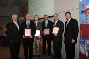  Texas A&M University System Chancellor Mike McKinney (left) and OTC's Guy Diedrich (right) flank Lance Bullard, Roger Bligh, Gene Buth and Dean Alberson. Hayes Ross is not pictured.