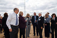 Dennis Christiansen, Lou Ann McKinney (second from left) and Mike McKinney and others discuss the crash test.