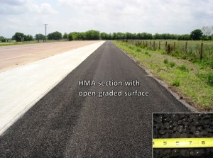photo: open-graded hot-mix asphalt (HMA) section adjacent to CRCP test track