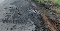 picture 1 of 3 showing type of pavement failure
