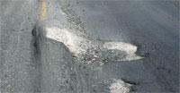 picture 2 of 3 showing type of pavement failure