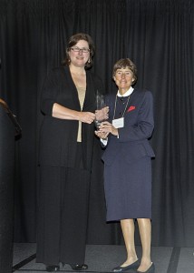 This is a photo of Katie Turnbull receiving a lifetime achievement award.