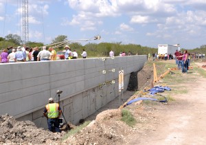 This is a photo of a retaining wall after a crash test.