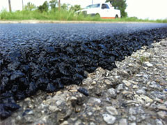 closeup of a final mat of SMA thin asphalt overlay
