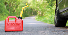 gas can, car on a rural roadway