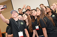TDS Summit participants take a group selfie