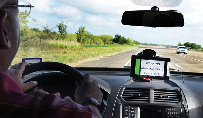 wrong-way driver warning message displayed on a mobile device in a vehicle driving during a technology demonstration held at RELLIS Campus