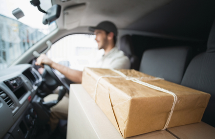 Delivery driver with packages